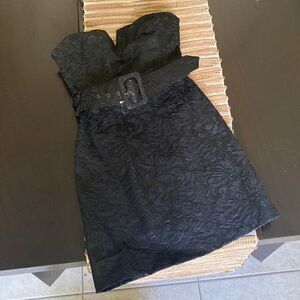 NWOT free People black strapless brocade looking material. Size 4